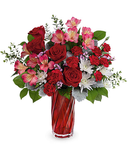 Teleflora’s Swirling Splendor-Graceful swirling flower arrangement for an elegant anniversary